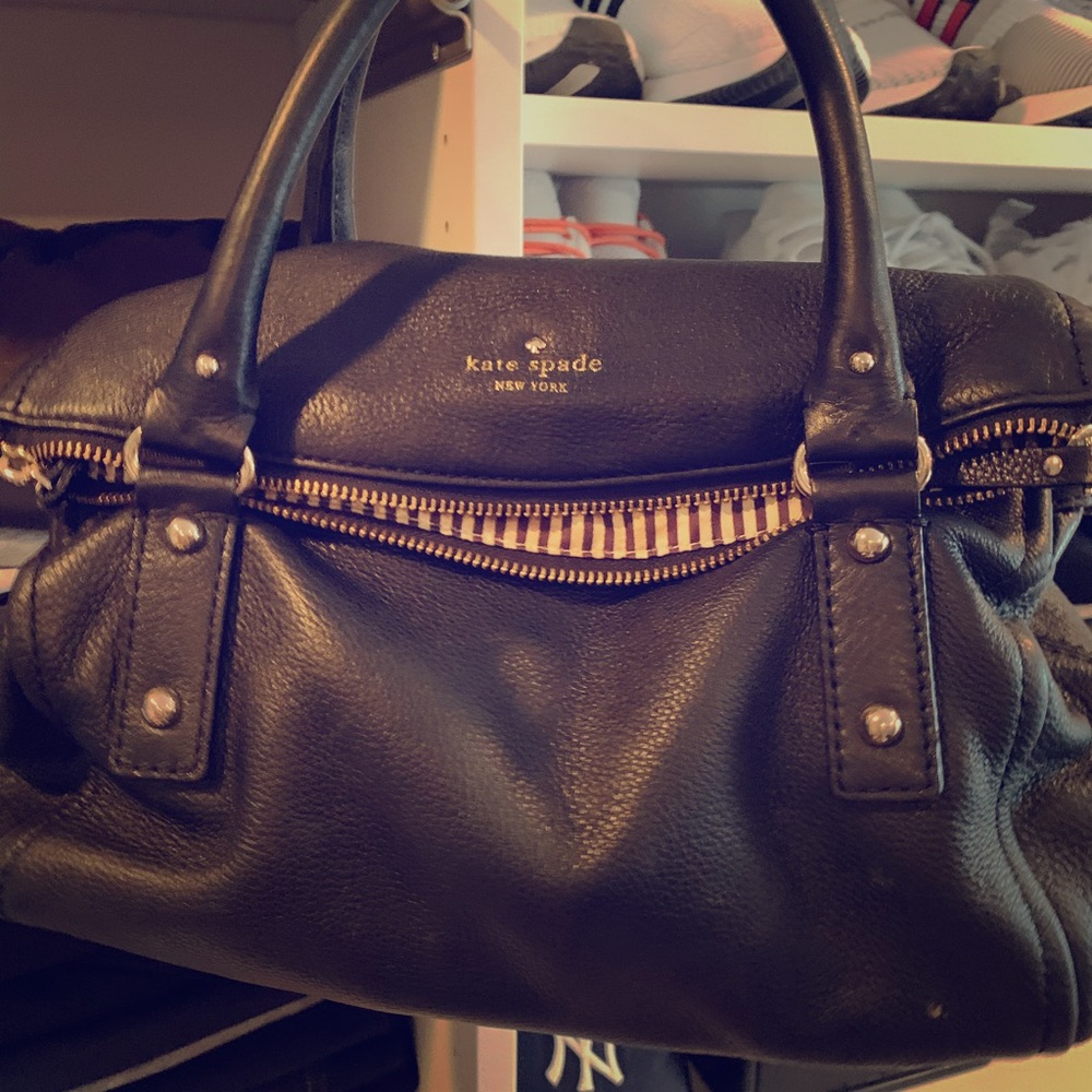 Kate Spade black leather handbag striped interior